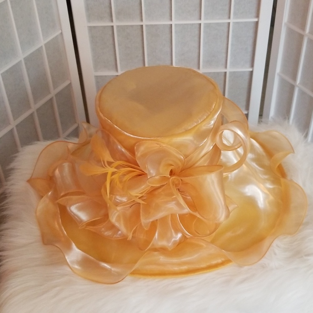 Beautiful satin yellow gold hat